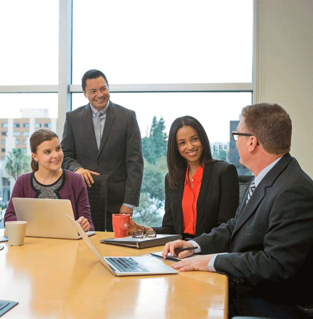 employees at a meeting 